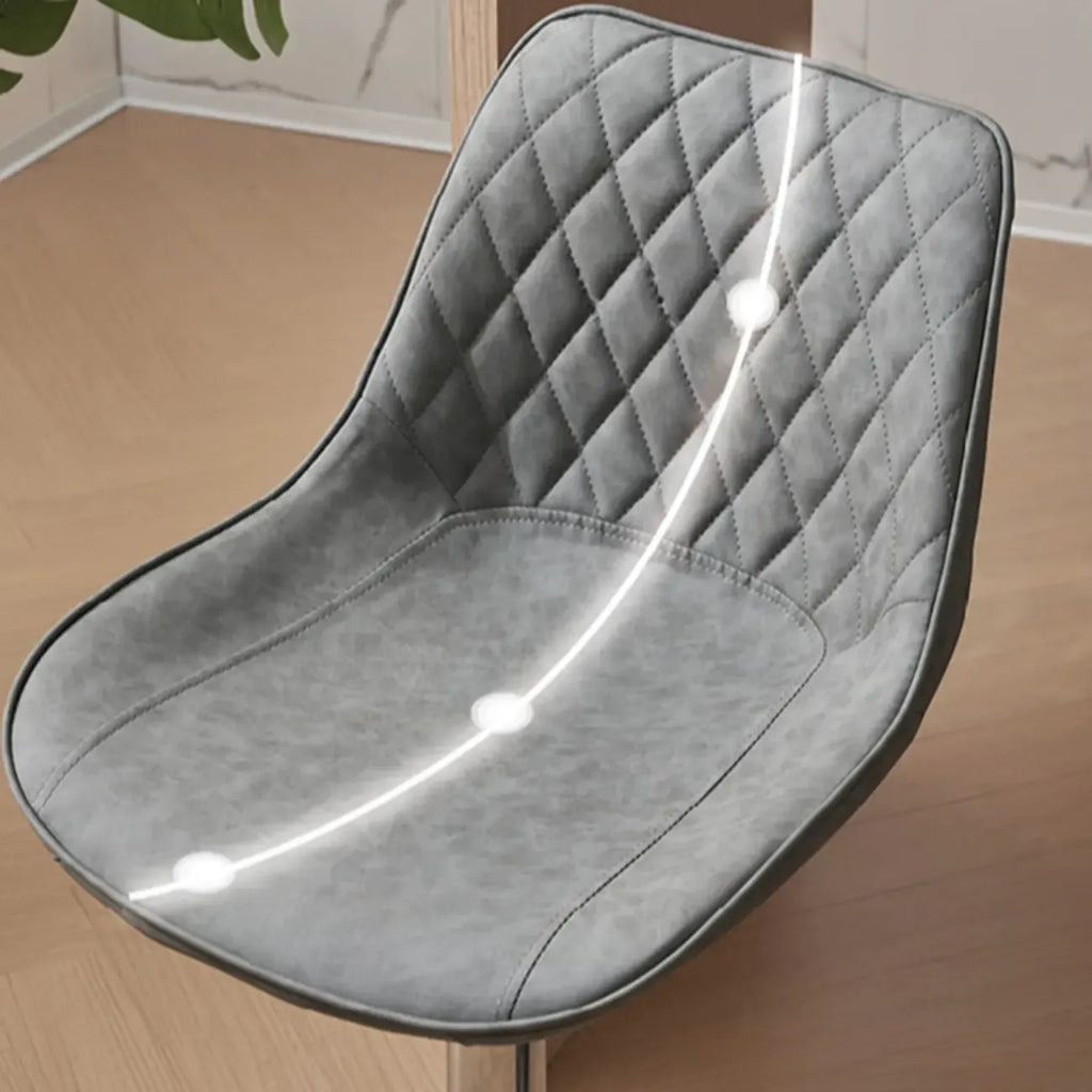Tabouret de bar pivotant et réglable en cuir capitonné chic