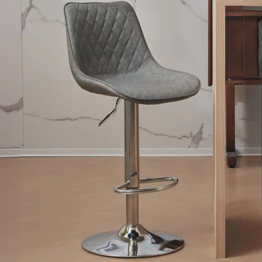 Tabouret de bar pivotant et réglable en cuir capitonné chic
