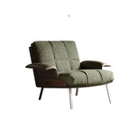 Fauteuil lounge moderne à accoudoirs évasés en tissu vert