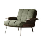 Fauteuil lounge moderne à accoudoirs évasés en tissu vert
