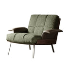 Fauteuil lounge moderne à accoudoirs évasés en tissu vert