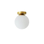 Plafonnier semi-encastré minimaliste en verre et métal, globe.