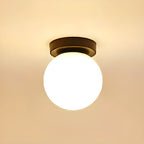 Plafonnier semi-encastré minimaliste en verre et métal, globe.