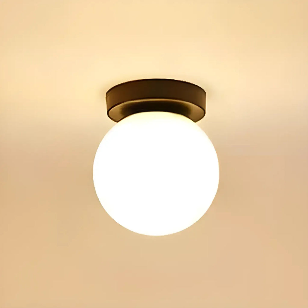 Plafonnier semi-encastré minimaliste en verre et métal, globe.
