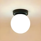 Plafonnier semi-encastré minimaliste en verre et métal, globe.
