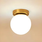 Plafonnier semi-encastré minimaliste en verre et métal, globe.