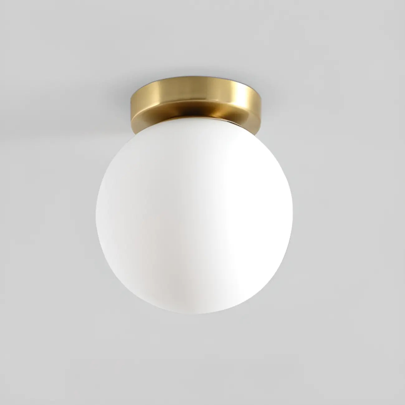 Plafonnier semi-encastré minimaliste en verre et métal, globe.