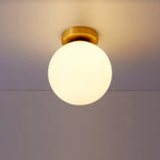 Plafonnier semi-encastré minimaliste en verre et métal, globe.