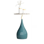 Table d'appoint ronde en pierre brune de style scandinave