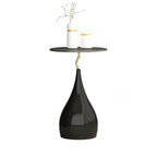 Table d'appoint ronde en pierre brune de style scandinave