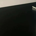 Meuble de rangement moderne en bois noir et verre cannelé pour salon