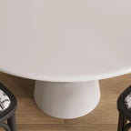 Table de salle à manger ronde en bois blanc à pied central, style décontracté