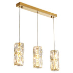 Suspension cylindrique en cristal pour îlot de cuisine, éclairage LED à intensité variable.