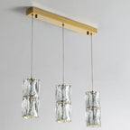 Suspension cylindrique en cristal pour îlot de cuisine, éclairage LED à intensité variable.