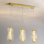 Suspension cylindrique en cristal pour îlot de cuisine, éclairage LED à intensité variable.