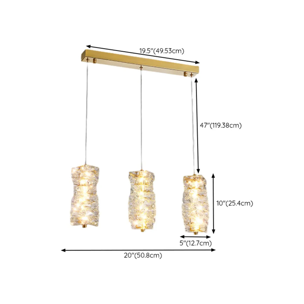 Suspension cylindrique en cristal pour îlot de cuisine, éclairage LED à intensité variable.