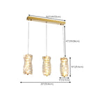 Suspension cylindrique en cristal pour îlot de cuisine, éclairage LED à intensité variable.