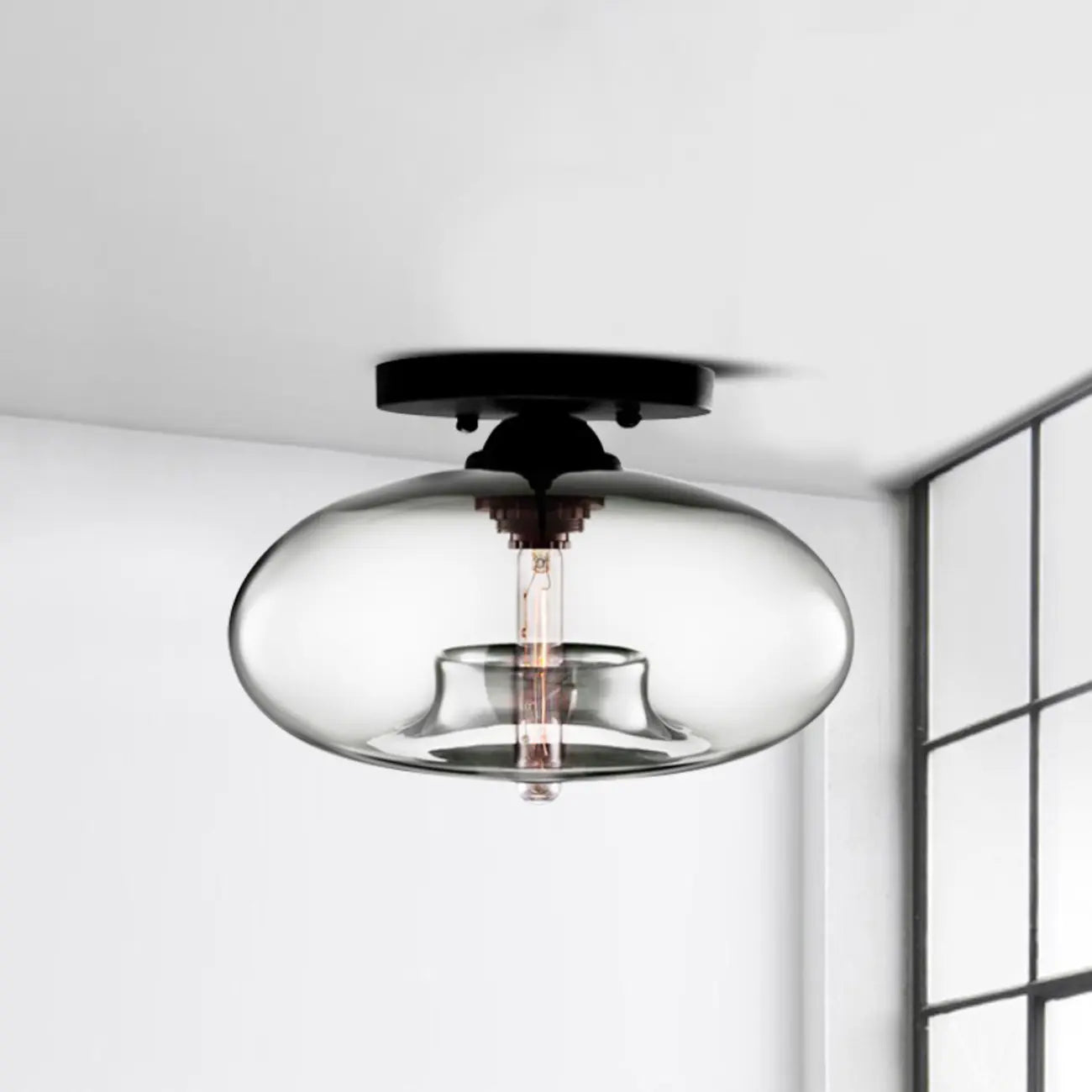Plafonnier semi-encastré industriel avec abat-jour cylindrique en verre transparent