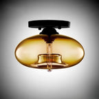 Plafonnier semi-encastré industriel avec abat-jour cylindrique en verre transparent