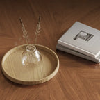 Table basse ronde gigogne avec piètement en métal et tiroirs en bois brun