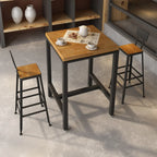 Table haute de bar de style industriel avec plateau en bois et repose-pieds pour les repas