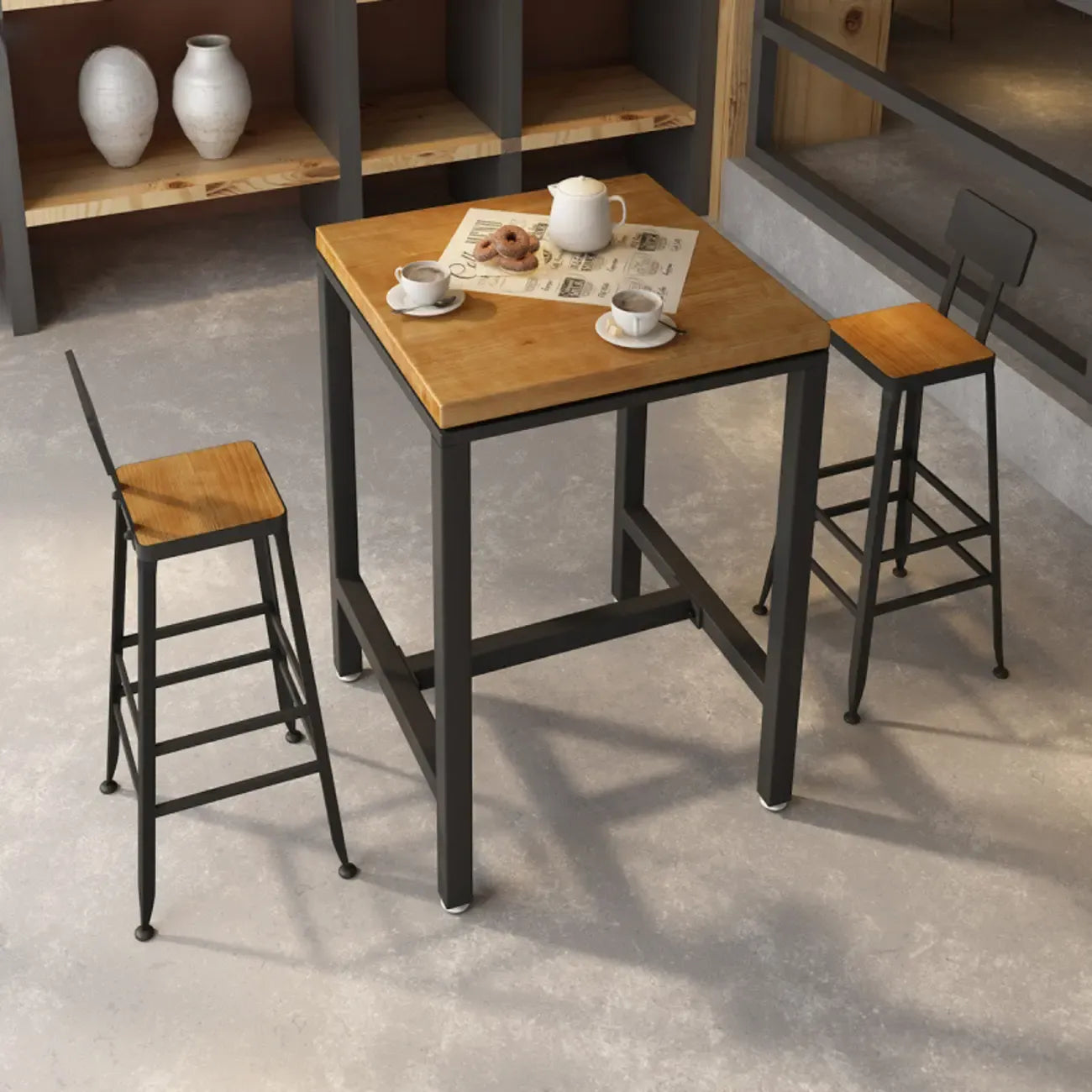 Table haute de bar de style industriel avec plateau en bois et repose-pieds pour les repas