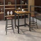 Table haute de bar de style industriel avec plateau en bois et repose-pieds pour les repas