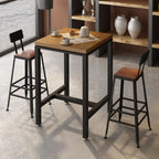Table haute de bar de style industriel avec plateau en bois et repose-pieds pour les repas