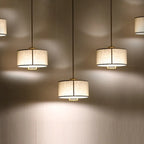 Suspension cylindrique élégante couleur ivoire pour intérieur