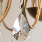 Lustre à bougies en alliage métallique de style moderne du milieu du siècle avec cristal