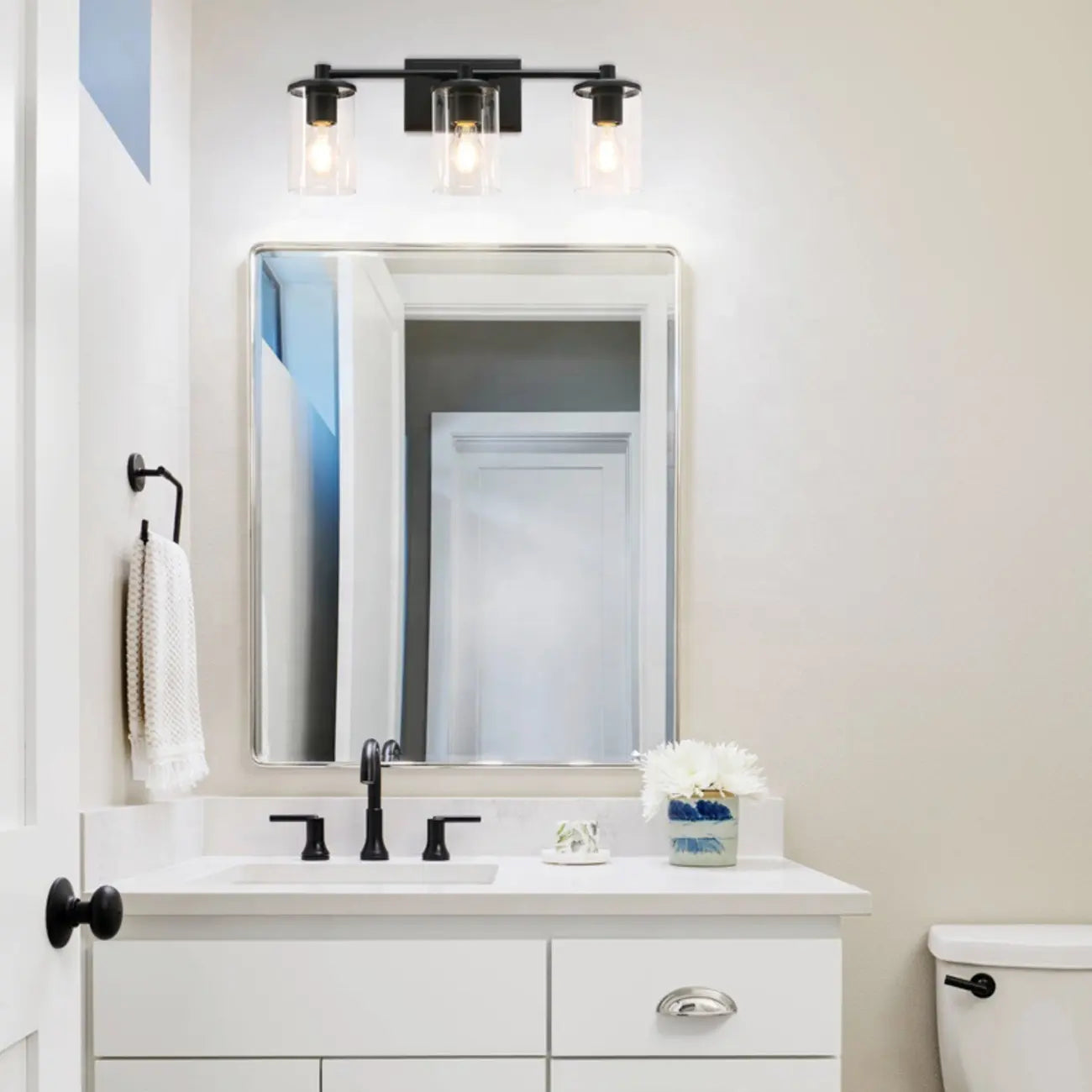 Applique da bagno a 3 luci in metallo nero e vetro trasparente cilindrico