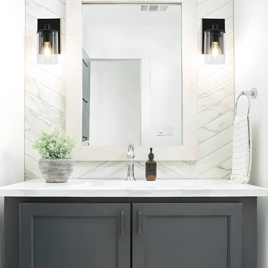 Applique da bagno a 3 luci in metallo nero e vetro trasparente cilindrico