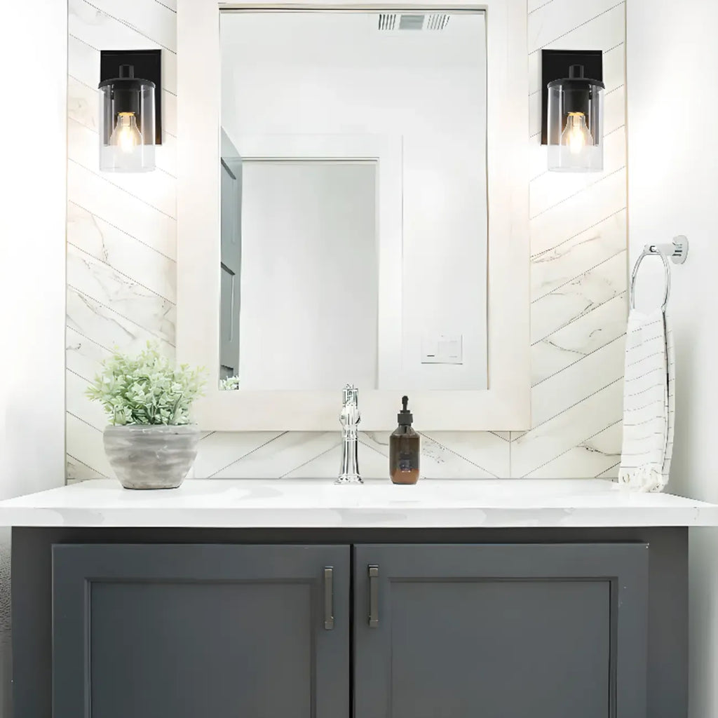 Applique da bagno a 3 luci in metallo nero e vetro trasparente cilindrico