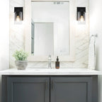 Applique da bagno a 3 luci in metallo nero e vetro trasparente cilindrico