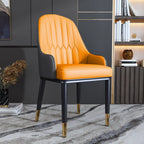 Chaise de salle à manger glamour en similicuir avec dossier incurvé et accoudoirs