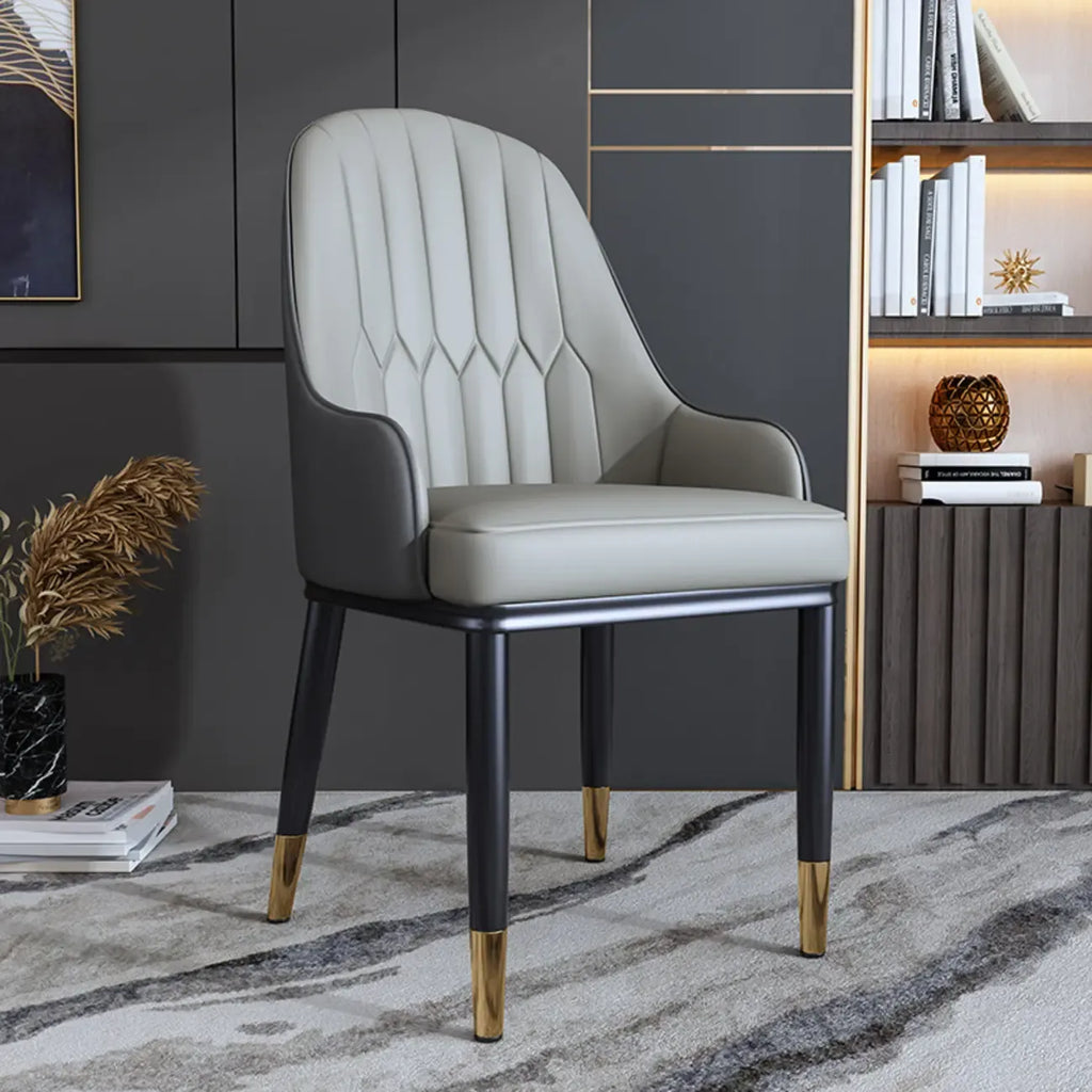 Chaise de salle à manger glamour en similicuir avec dossier incurvé et accoudoirs