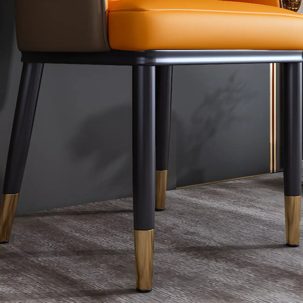 Chaise de salle à manger glamour en similicuir avec dossier incurvé et accoudoirs