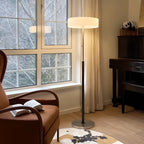 Lampadaire cylindrique moderne en verre argenté à brancher pour salon