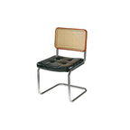 Chaise de salle à manger moderne marron à dossier tissé, en similicuir marron, à dossier cantilever.