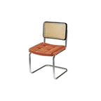 Chaise de salle à manger moderne marron à dossier tissé, en similicuir marron, à dossier cantilever.