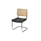 Chaise de salle à manger moderne marron à dossier tissé, en similicuir marron, à dossier cantilever.