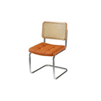 Chaise de salle à manger moderne marron à dossier tissé, en similicuir marron, à dossier cantilever.