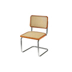 Chaise de salle à manger moderne marron à dossier tissé, en similicuir marron, à dossier cantilever.