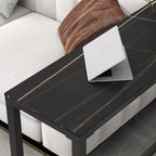 Table de bar moderne avec plateau en pierre noire, piètement à tréteaux et repose-pieds