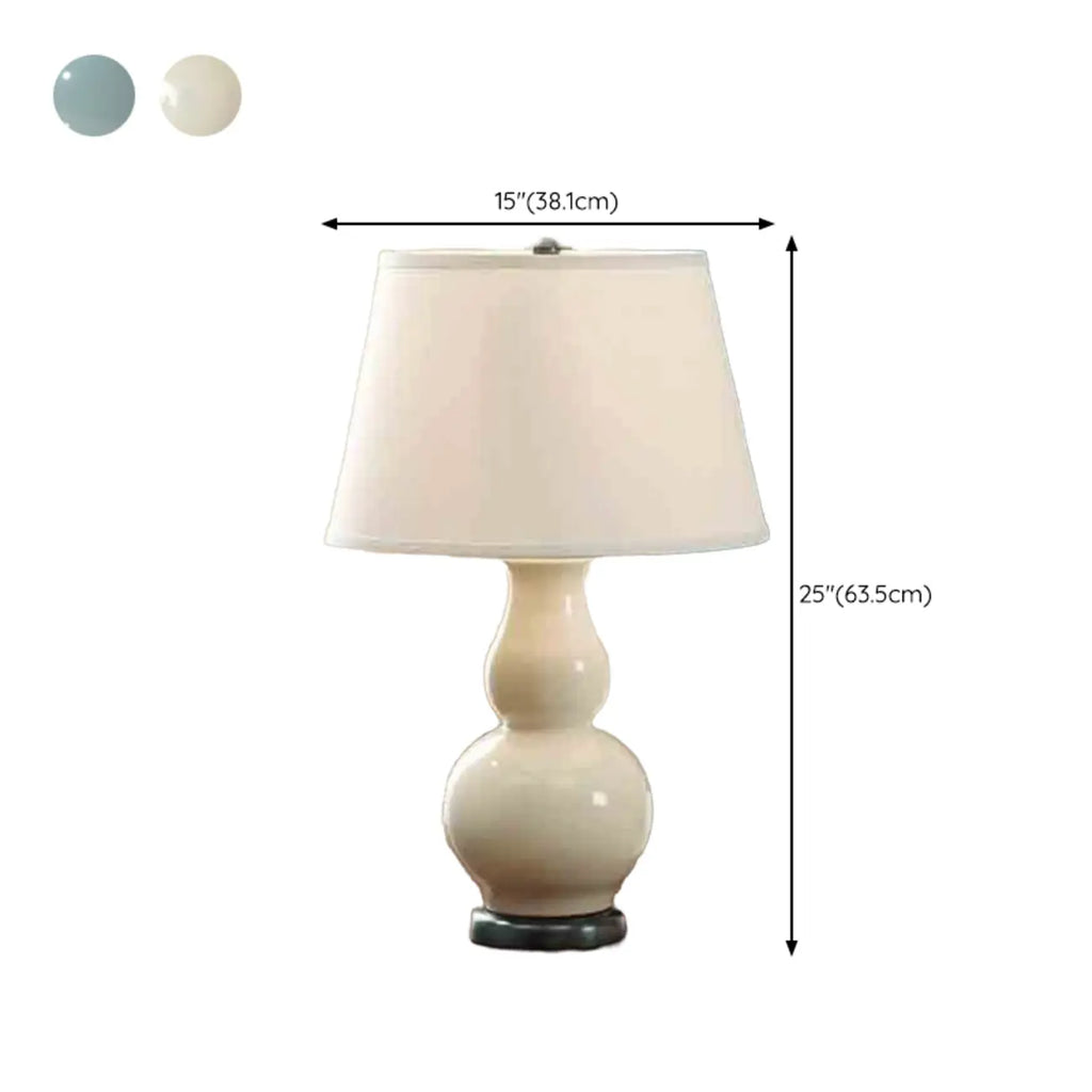 Lampe de table élégante en céramique blanche avec LED et abat-jour en tissu