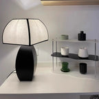 Lampe de table moderne en métal noir avec LED et abat-jour en forme de dôme