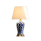 Lampe de table élégante en céramique avec abat-jour en tissu géométrique