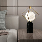 Lampe de table LED élégante à brancher, en pierre et verre, avec globe.