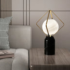 Lampe de table LED élégante à brancher, en pierre et verre, avec globe.
