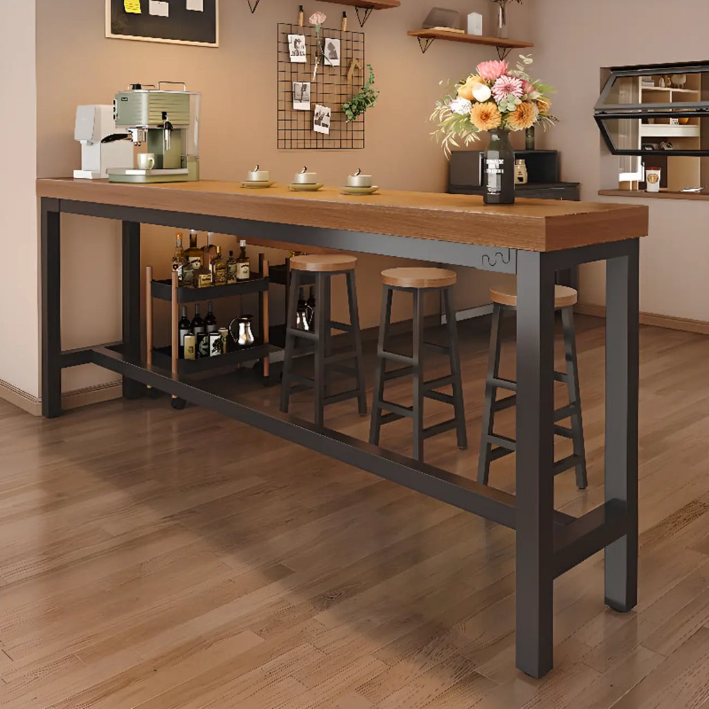 Table de bar industrielle en bois brun avec repose-pieds pour pub à domicile
